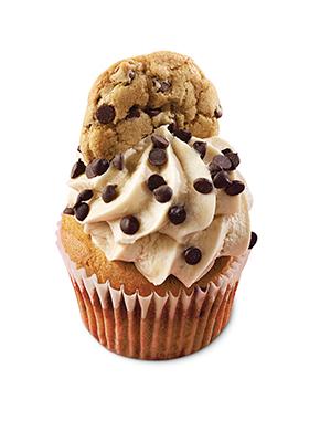 Image of a chocolate cupcake with chocolate chips and a cookie on top
